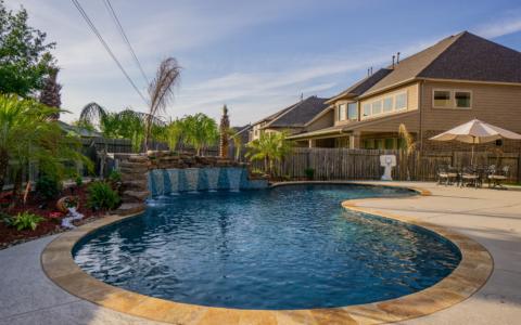 Large fountain feature near a sandstone lined pool